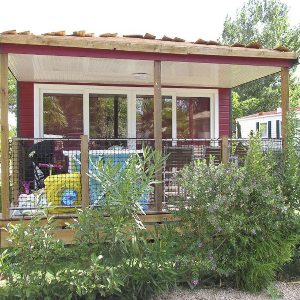 Camping Californie Plage - Hébergements - Mobil-home Cap\'tain Sparrow Premium - Terrasse couverte